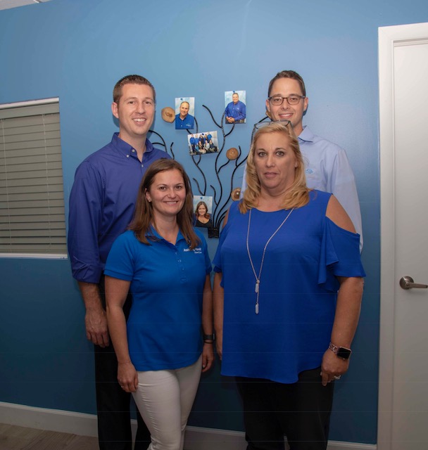 Andrew Dahle, Tyler Moss, Deanna Koppel and Gail Stout Assisting Hands National Office.