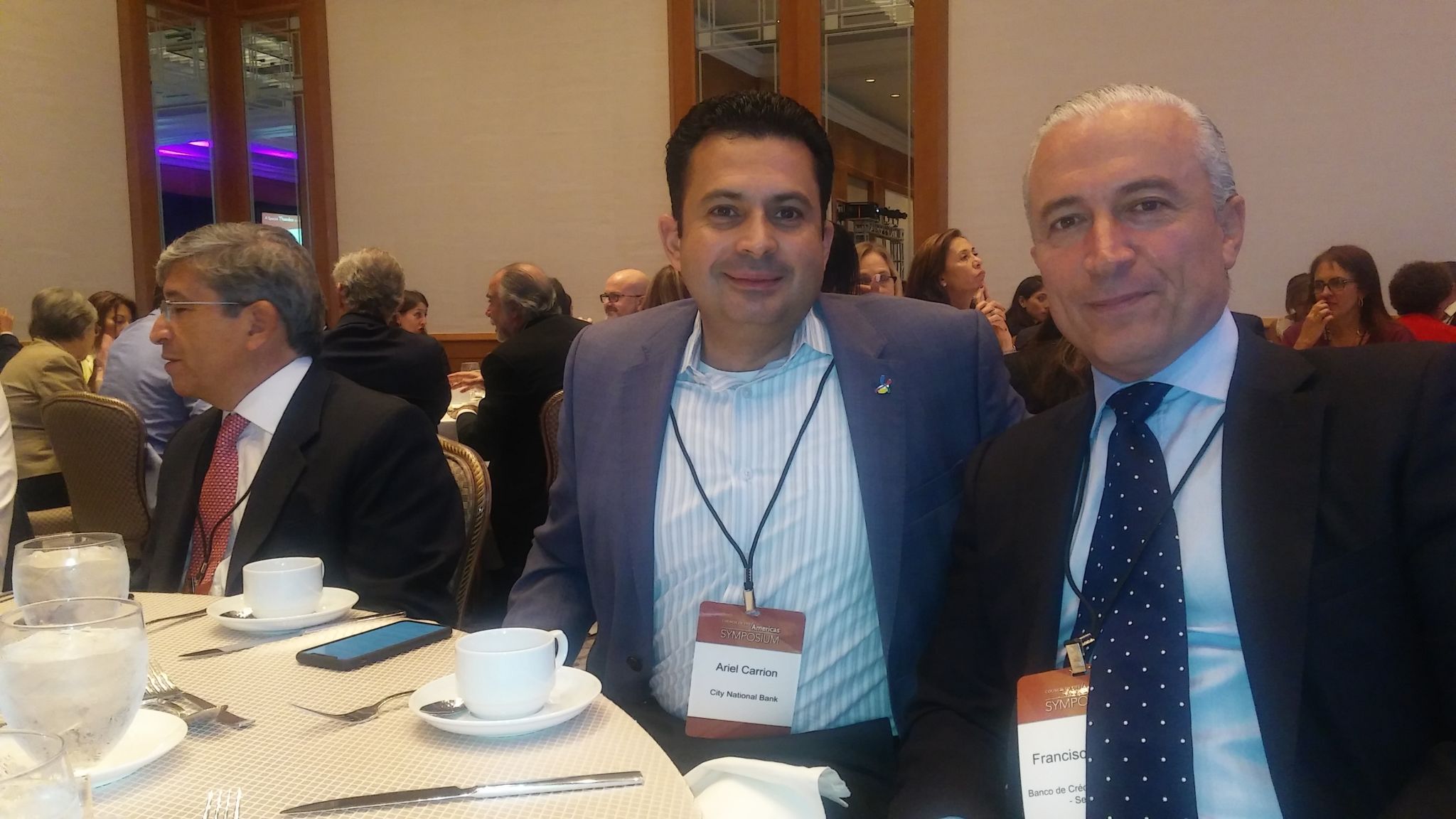 Ariel Carrion de City National Bank y Francisco J Garcia, director de Desarrollo de Negocios de Bci.